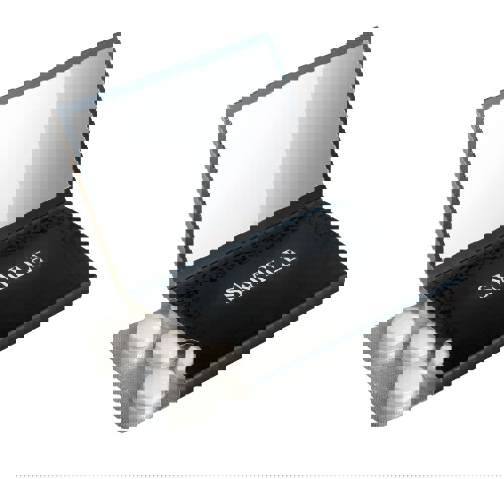 Sleeve met flap, spiegeltje en blister met 10 Compli'mints